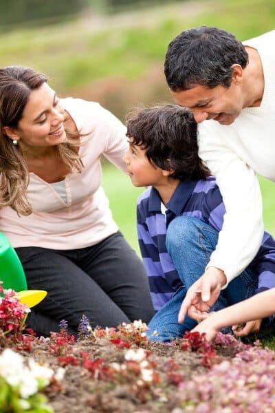 man woman children garden