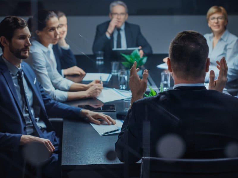CEO in a board room
